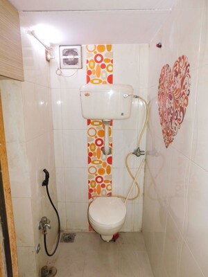Bathroom in 2 BHK Apartment at Minoo Apartment, Vile Parle East – for Rent