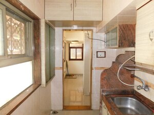 Living Room in 2 BHK Apartment at Minoo Apartment, Vile Parle East – for Rent