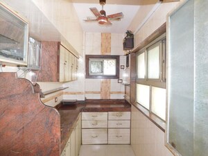 Kitchen in 2 BHK Apartment at Minoo Apartment, Vile Parle East – for Rent