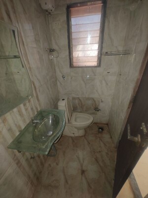 Bathroom in 2 BHK Apartment at Seawoods – for Rent