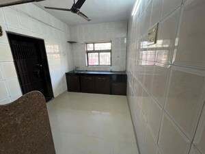 Building Lobby in 2 BHK Apartment at Vijay Nagari Annex, Waghbil – for Rent