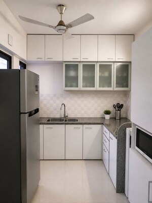 Kitchen in 2 BHK Apartment at Alcon Rethos Apartment, Kharadi – for Rent
