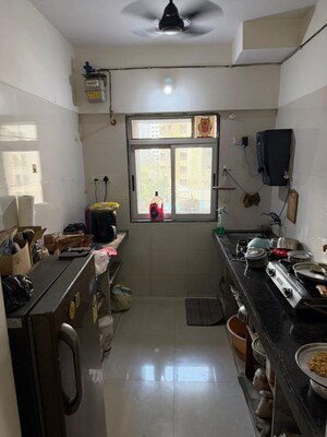 Kitchen in 2 BHK Apartment at Vihang Hills, Ghodbunder Road – for Rent