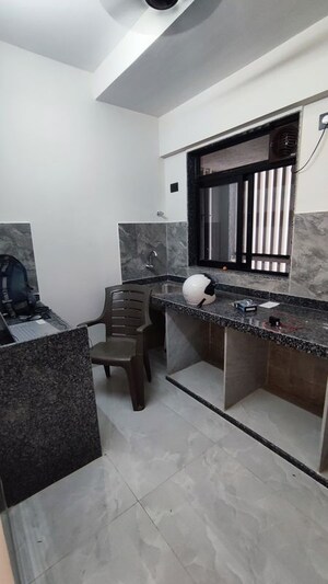 Kitchen in 2 BHK Apartment at Paradigm Antalya, Oshiwara – for Rent
