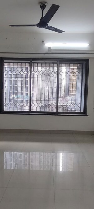 Room in 2 BHK Apartment at Palash Towers, Andheri West – for Rent