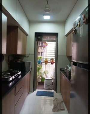 Kitchen in 2 BHK Apartment at Vedant Complex CHS, Samata Nagar – for Rent