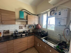 Kitchen in 3 BHK Apartment at Migsun Ultimo, Omicron Iii Greater Noida – for Rent