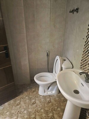 Bathroom in 2 BHK Apartment at Galaxy Royale, Gaur City 2 – for Rent