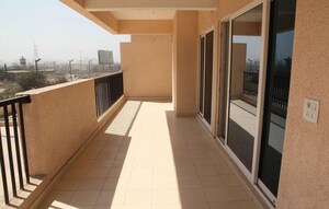 Kitchen in 2 BHK Apartment at Gaur City 2 - 14th Avenue, Sector 16c Greater Noida – for Rent