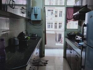 Kitchen in 2 BHK Apartment at Uninav Heights Phase I, Raj Nagar Extension – for Sale