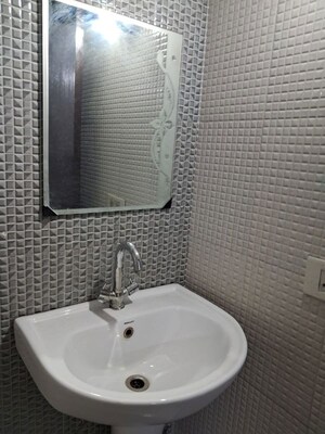 Bathroom in 2 BHK Apartment at Devika Skypers, Raj Nagar Extension – for Sale