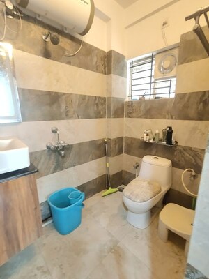Bathroom in 2 BHK Apartment at PNR Vasudhaa Raja Gruha, Hsr Layout – for Rent