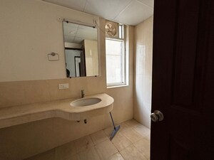 Bathroom in 3 BHK Apartment at Jaypee Greens Pavilion Court, Sector 128 – for Rent