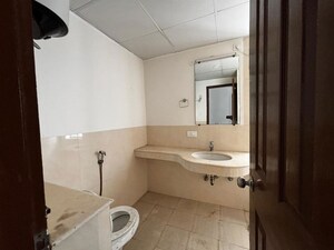 Bathroom in 3 BHK Apartment at Jaypee Greens Pavilion Court, Sector 128 – for Rent