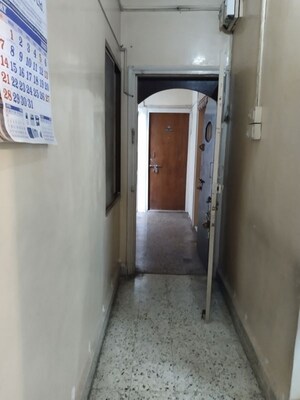 Building Lobby in 1 BHK Apartment at Dinshaw House, Camp – for Rent