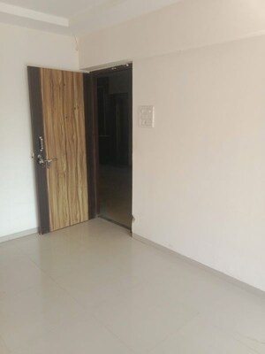 Room in 2 BHK Apartment at Navkar City Phase II, Naigaon East – for Rent