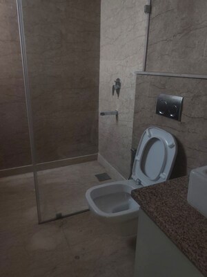 Bathroom in 4 BHK Apartment at Mahagun Mirabella, Sector 79 – for Rent