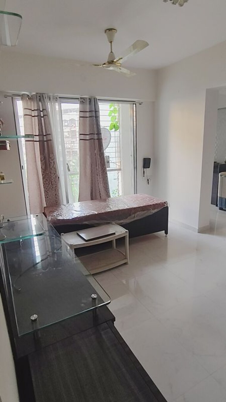 Living Room, shree-pancham-mira-road 1 Bedroom 625 Sq.Ft. Apartment In Mira Road Thane 10372388