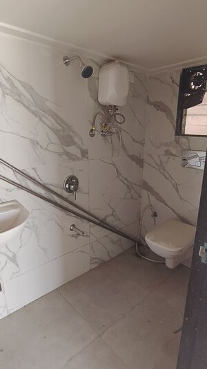 Bathroom in 2 BHK Apartment at RNA NG Diamond Hill, Beverly Park – for Sale