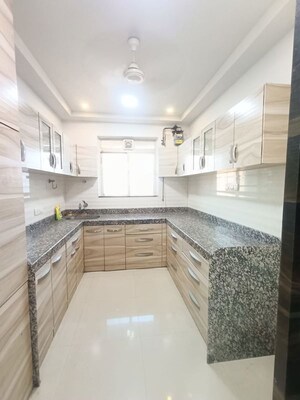 Kitchen in 3 BHK Apartment at Rustomjee Athena, Majiwada – for Rent