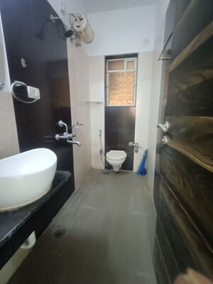 Bathroom in 3 BHK Apartment at Rustomjee Athena, Majiwada – for Rent