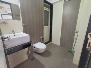 Bathroom in 3 BHK Apartment at Rustomjee Athena, Majiwada – for Rent