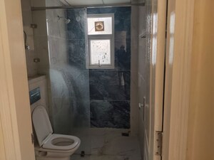 Bathroom in 3 BHK Apartment at Omaxe The Palace, Gomti Nagar – for Rent