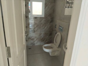 Bathroom in 3 BHK Apartment at Omaxe The Palace, Gomti Nagar – for Rent
