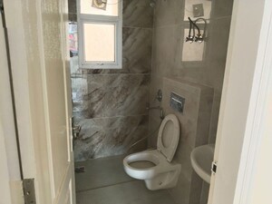 Bathroom in 3 BHK Apartment at Omaxe The Palace, Gomti Nagar – for Rent