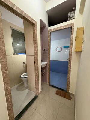 Bathroom in 2 BHK Apartment at Cosmos Horizon, Thane West – for Rent