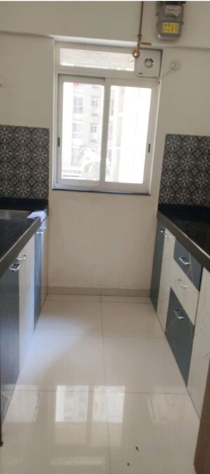 Kitchen in 2 BHK Apartment at Lodha Amara, Kolshet Road – for Sale