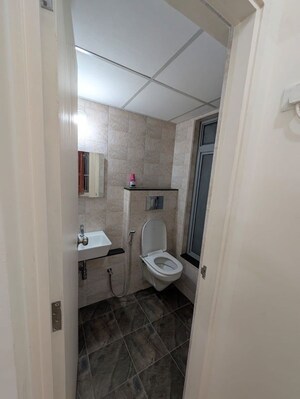 Bathroom in 1 BHK Apartment at Mahindra Happinest Tathawade Phase 1, Tathawade – for Rent