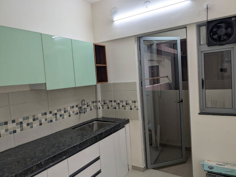 Kitchen, mahindra-happinest-tathawade-phase-1 1 Bedroom 440 Sq.Ft. Apartment In Tathawade Pune 10372797