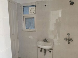 Bathroom in 3 BHK Apartment at KLJ Greens, Sector 77 – for Rent