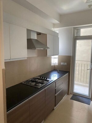 Kitchen in 3 BHK Apartment at Conscient Heritage Max, Sector 102 – for Rent