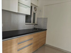 Kitchen in 2 BHK Apartment at Omkar Signet, Malad East – for Rent