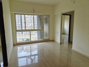 Room in 2 BHK Apartment at Omkar Signet, Malad East – for Rent