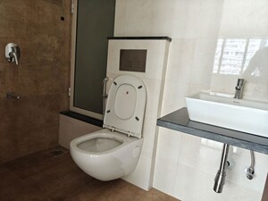 Bathroom in 2 BHK Apartment at Omkar Signet, Malad East – for Rent