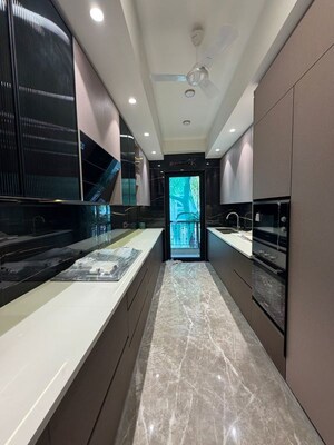 Kitchen in 4 BHK Builder Floor at Nirvana Country – for Sale
