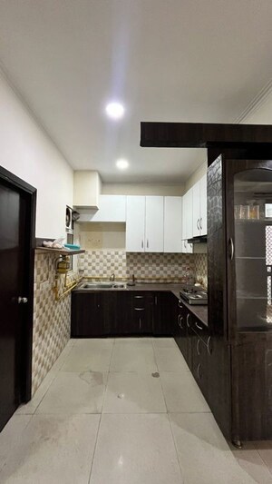 Kitchen in 2 BHK Apartment at AIG Park Avenue, Sector 4 Greater Noida – for Rent