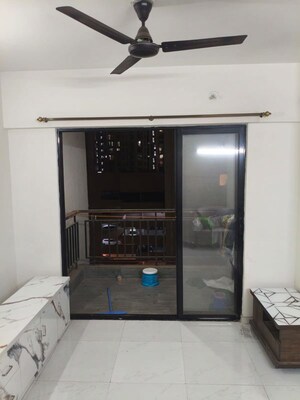 Living Room in 2 BHK Apartment at Runwal Gardens, Dombivli East – for Rent