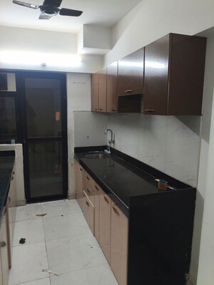 Kitchen in 2 BHK Apartment at Runwal Gardens, Dombivli East – for Rent