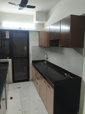 Kitchen in 2 BHK Apartment at Runwal Gardens, Dombivli East – for Rent