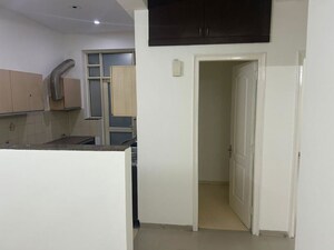Room in 2 BHK Apartment at Paradigm Business Hermitage Park, Dhakoli – for Rent