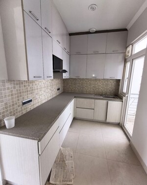 Kitchen in 2.5 BHK Builder Floor at Central Park Flower Valley, Sohna Sector 33 – for Rent