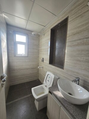 Bathroom in 2.5 BHK Builder Floor at Central Park Cerise Suites, Sohna Sector 33 – for Rent