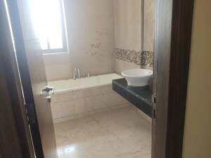 Bathroom in 2 BHK Apartment at M3M Golf Estate, Sector 65 – for Rent
