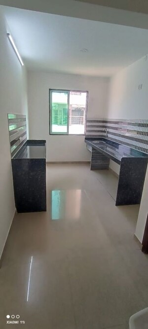 Kitchen in 1 BHK Apartment at Sonar Pada – for Sale