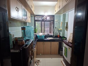 Kitchen in 2 BHK Apartment at NG Complex, Andheri East – for Rent