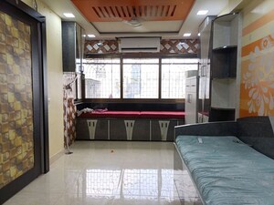 Living Room in 1 BHK Apartment at Malad East – for Sale